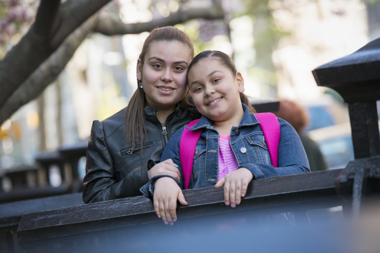 hispanic latinx mother and child outside